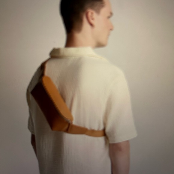 MON1500 Crafted with water-resistant, ultra microfiber vegan leather, the - Picture 8 of 10